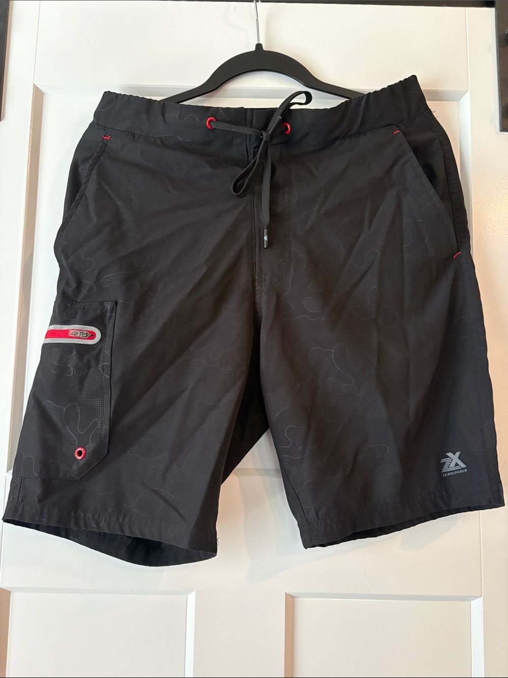 ZeroXposur Black Swim Board Shorts with Red Accents